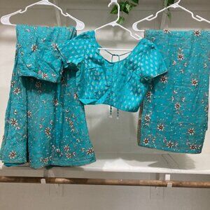Turquoise chaniya (lehengas) choli with beautiful dupatta